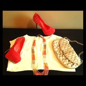 High heel spiked platform pump. Faux suede