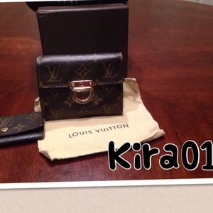 Sold Authentic Louis Vuitton Koala Wallet