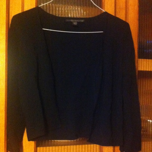 A black dressy crop sweater.