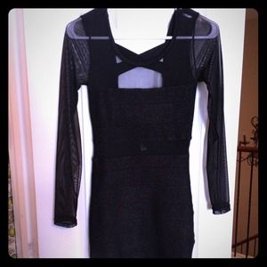 Cute little black dress! Mesh sleeves &cutout back