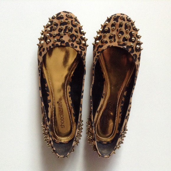 Shoedazzle spiked leopard print flats.