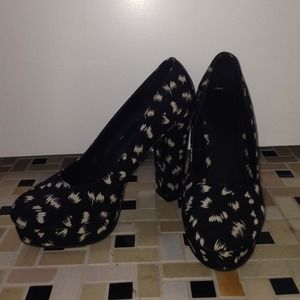 Black and white scratched heels