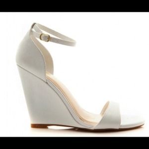Never worn size 7 white single sole wedge heels