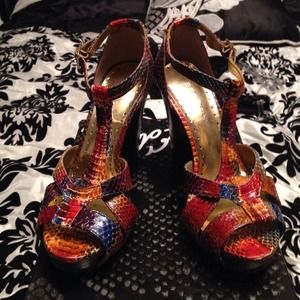 BCBG snakeskin pattern platform heels.