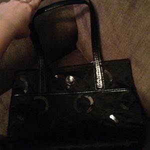 New black sequin Coach purse with tags