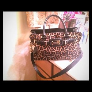 Authentic Michael kors limited supply leopard fur