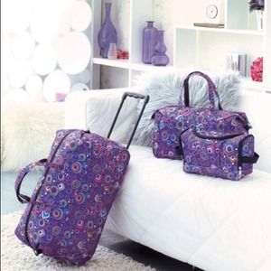 3 piece luggage set - purple with circles.