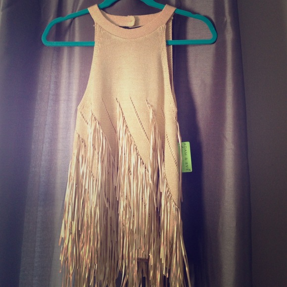 NWT Fringe sweater with an open back.
