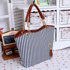 Blue and white striped tassel tote handbag
