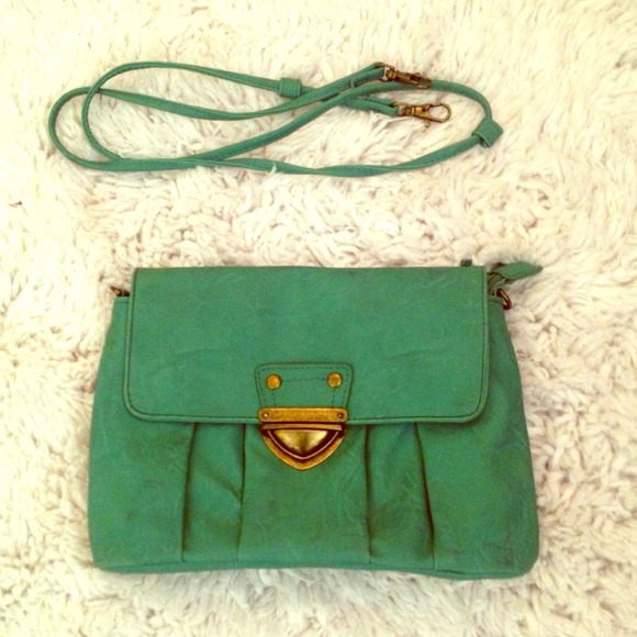 Green with gold buckle clutch