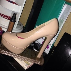 High heel worn . Still in great condition