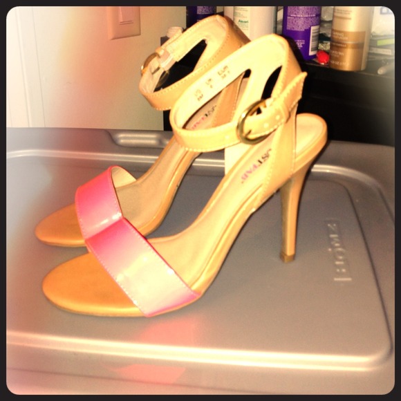 Neon pink strappy heels. Never been worn.