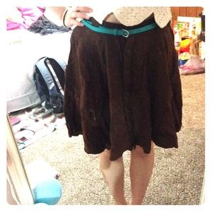 Brown skirt with green belt