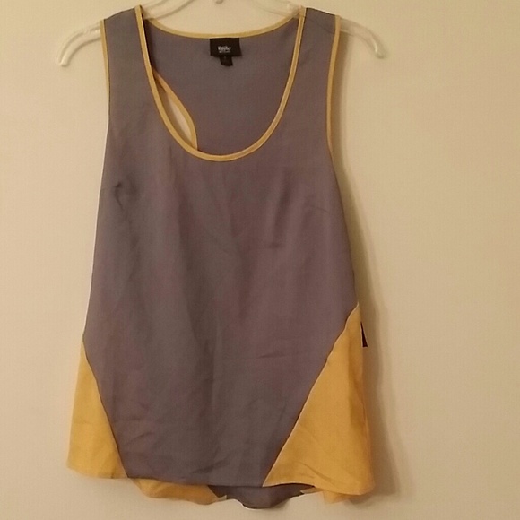 SOLD .....Grey and yellow tank with razor back