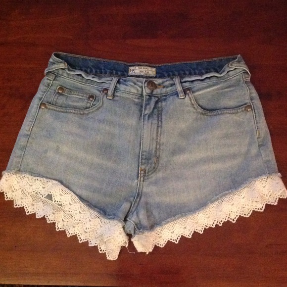 Free People denim cutoff shorts with lace trim