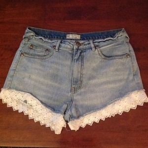 Free People denim cutoff shorts with lace trim