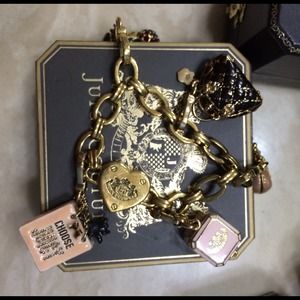 Authentic juicy bracelet with charms