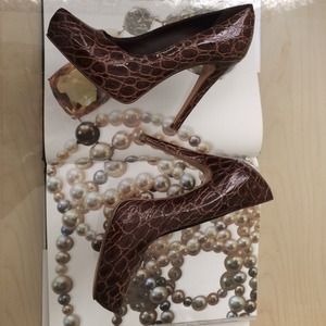 Aldo patent chocolate brown pumps