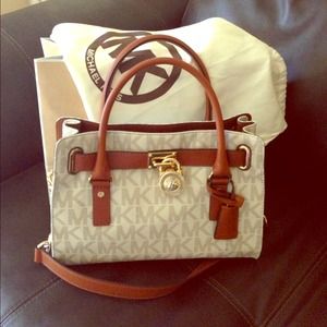 👜