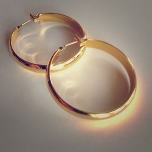 Monet gold tone hoop earrings.