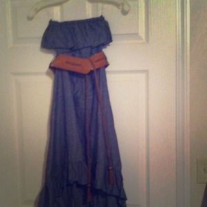 Medium size stretch jean dress with brown belt.