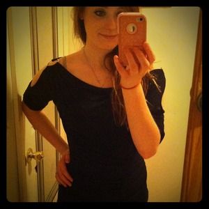 Black top. Exposed shoulders