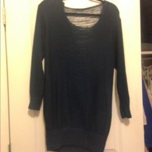 Dark blue sweater with open back