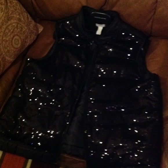Chico brand black sequined quilted vest.