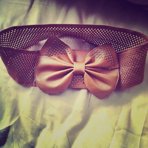 Light brown and gold studded bow tie waist belt
