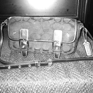 Black and silver, coach bag.
