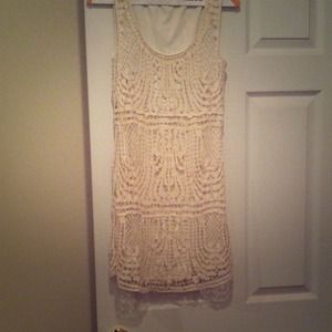 Cream-colored crocheted dress