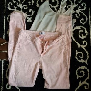 Light pink skinny jeans