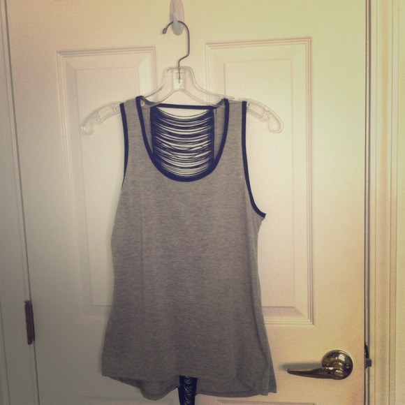 Grey summer shirt with slightly open back.