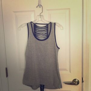 Grey summer shirt with slightly open back.