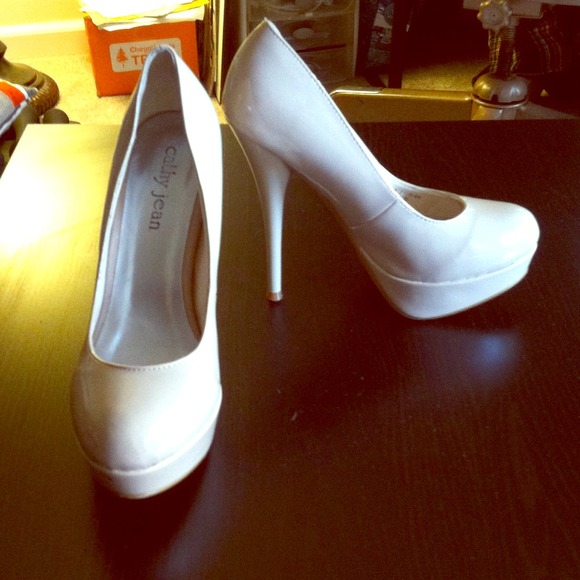 Patent beige pumps.