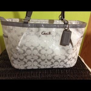 Reduced coach signature handbag.
