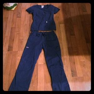 Sketchers navy scrubs xs top and small pants.