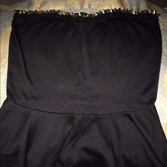 Black Peplum top with gold spikes