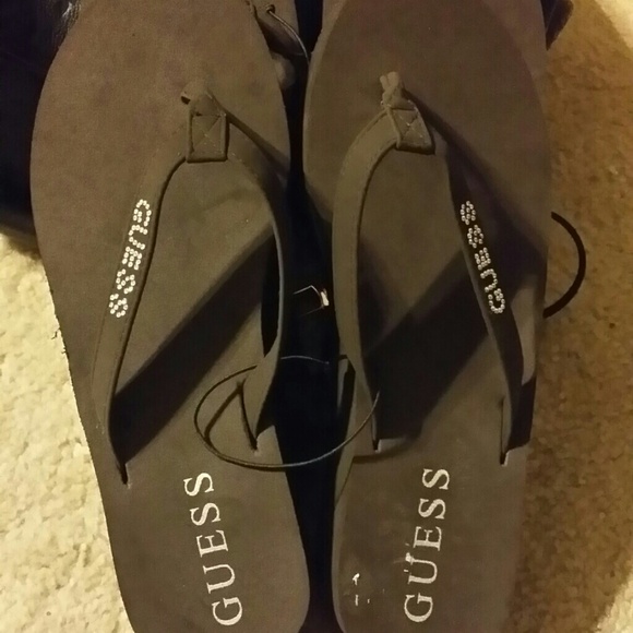 ##SOLD#Brown Guess Flip Flops..