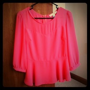 Coral peplum top