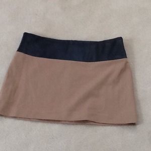 Sexy mini with "leather" band at waist.