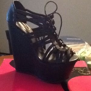 Black strap wedge heels