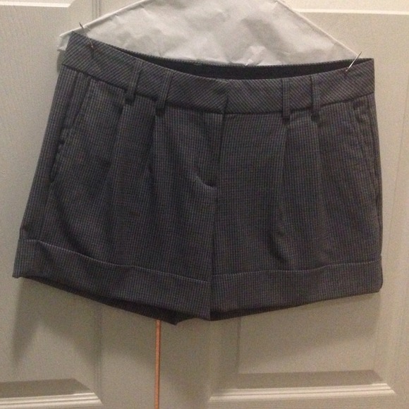 Black and blue plaid Express cuffed shorts.