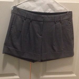 Black and blue plaid Express cuffed shorts.