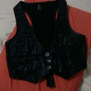 A denim black animal print vest
