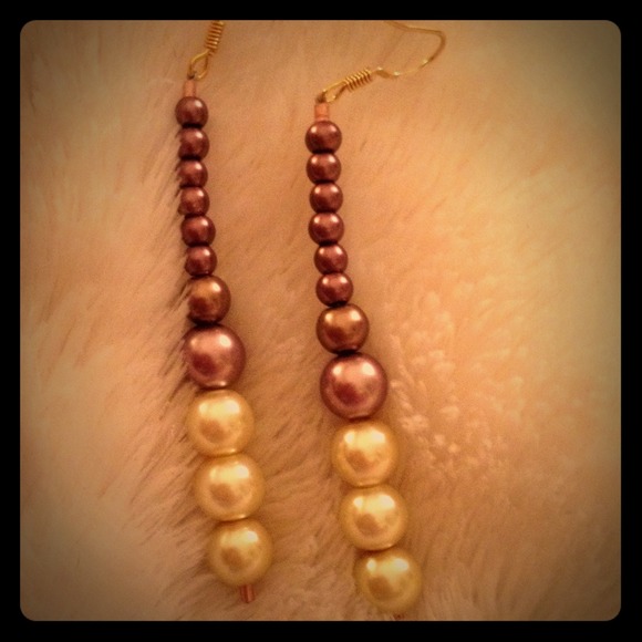 Chocolate and white pearl earrings.