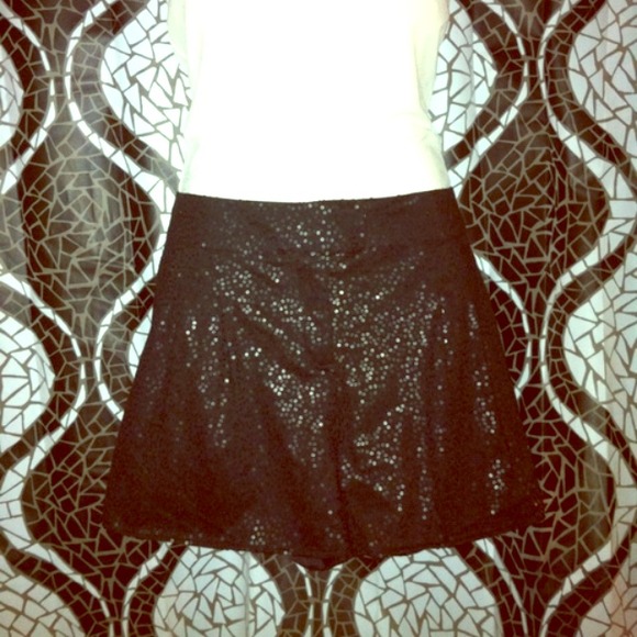 Jennifer Lopez black sequined shorts