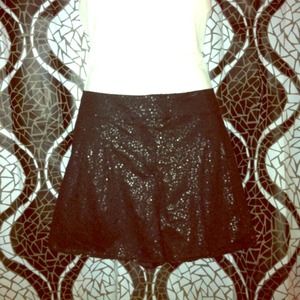 Jennifer Lopez black sequined shorts