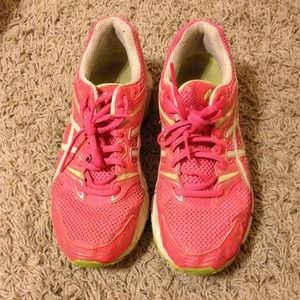 Neon pink and green asics running shoes