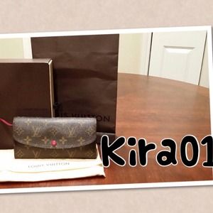 SOLD on eBayAuthentic Louis Vuitton Emillie Wallet